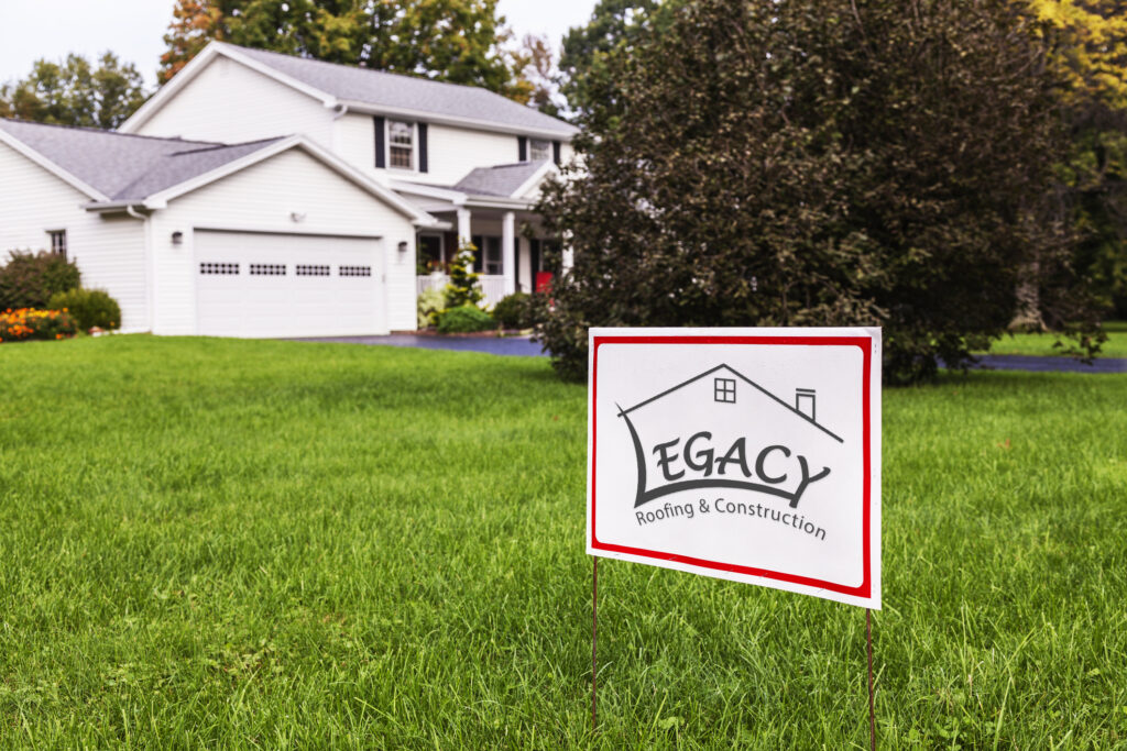 Legacy Roofing sign in yard